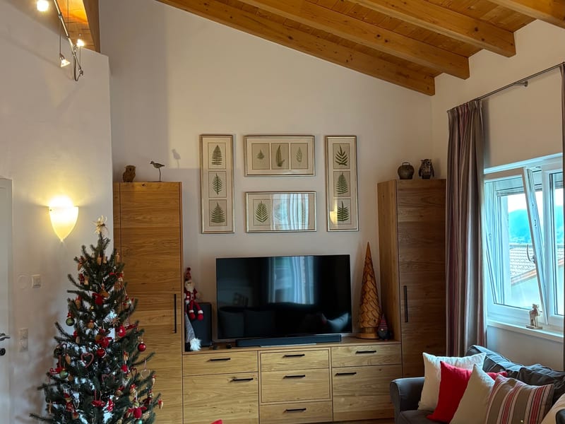 Living room with vaulted pine ceiling